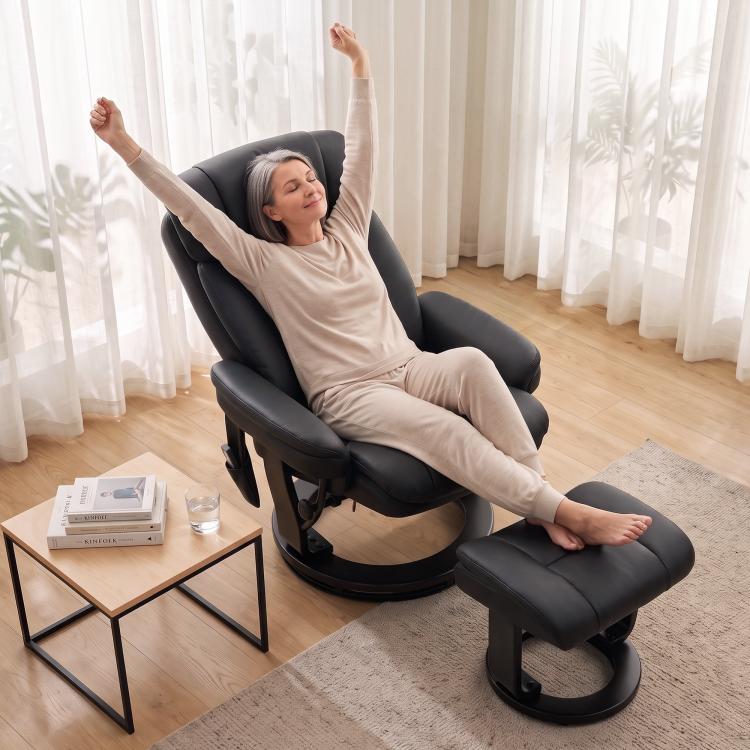 Black PU massage recliner chair with ottoman raised for full recline