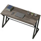 Distressed gray computer desk with black Z-leg frame and wide rectangular tabletop