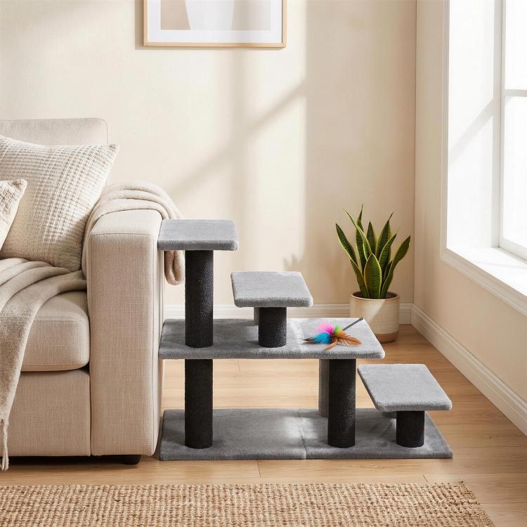Gray fabric pet stairs with multiple steps and dark support posts