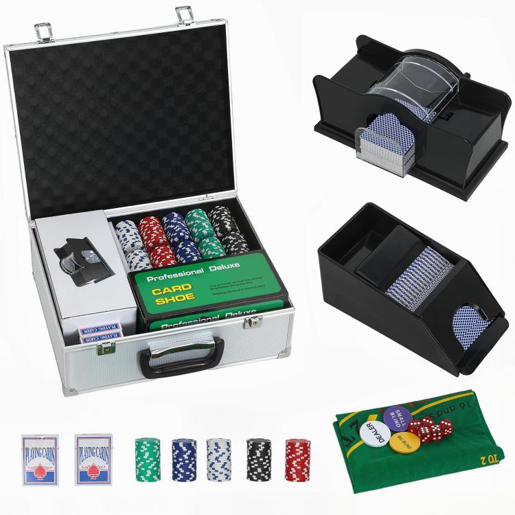 Poker chip set with open aluminum case, card shuffler, chip trays, and dealer items