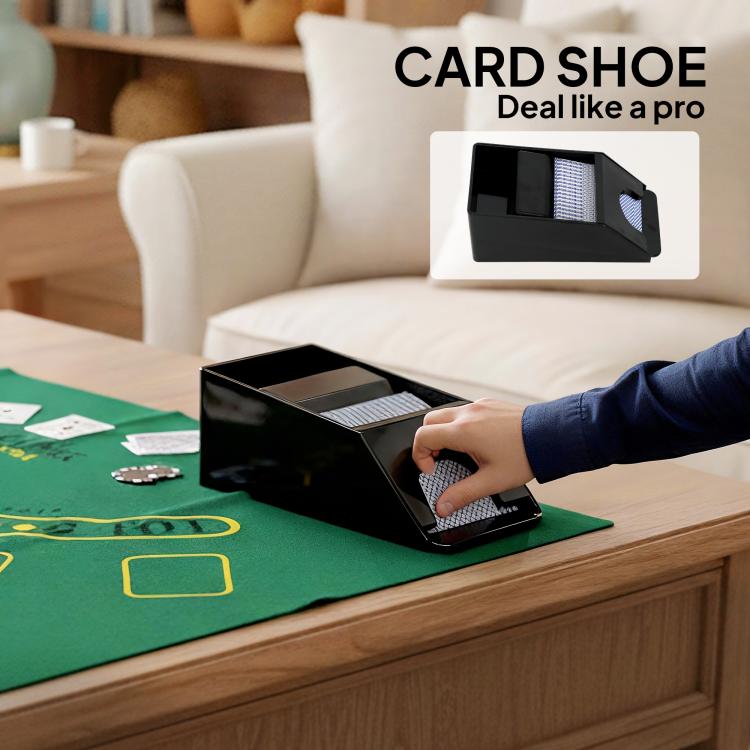 Black card shoe with stacked cards on a poker table
