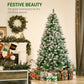 Snow-dusted artificial fir Christmas tree with pine cones and full layered branches