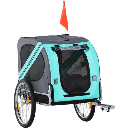 Green dog bike trailer with large wheels, mesh windows, and zippered doors