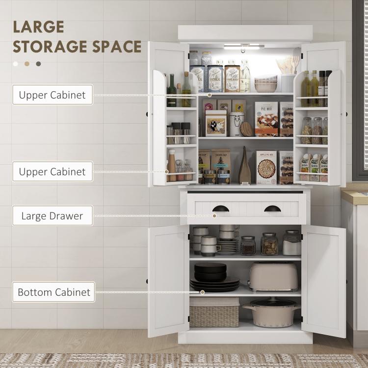 White kitchen pantry cabinet with upper cabinets, large drawer, and bottom storage