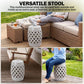 White ceramic lattice garden stool used as extra seating, with round perforated top.