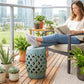 Ceramic garden stool in antique blue with woven lattice cutout sides and round top