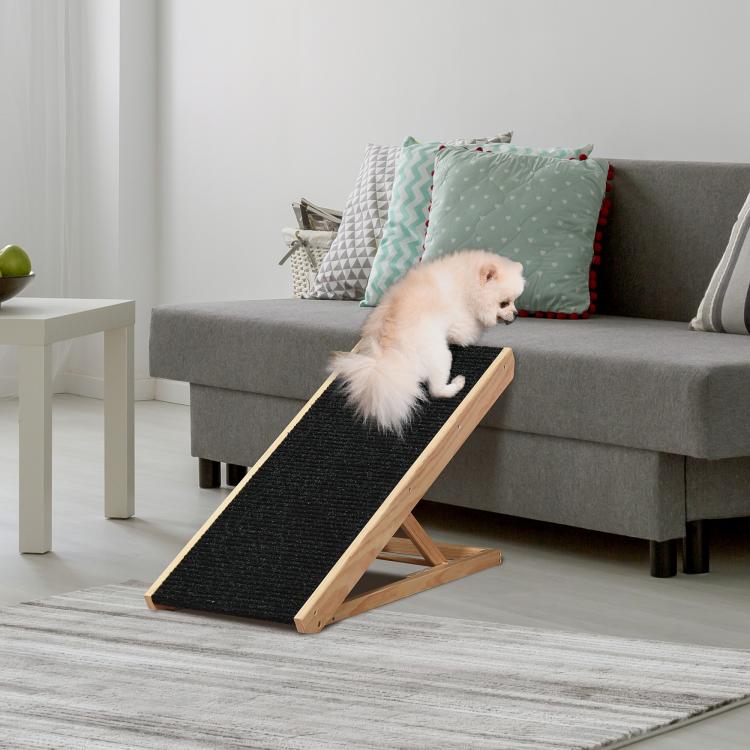 Pet ramp with black non-slip tread and light pine frame, cat using the ramp