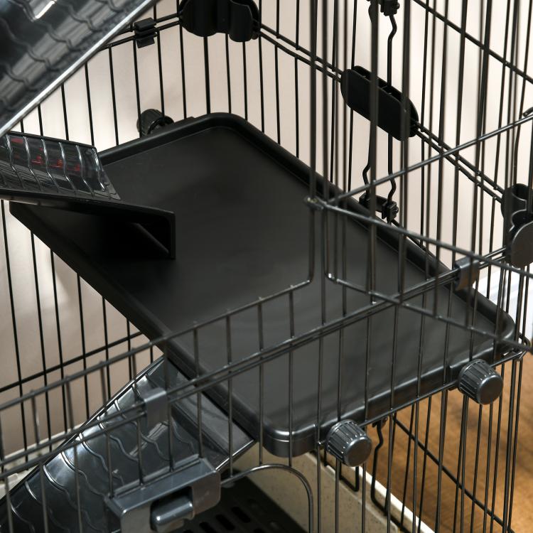 Black multi-level small animal cage with slide-out tray and wheel base