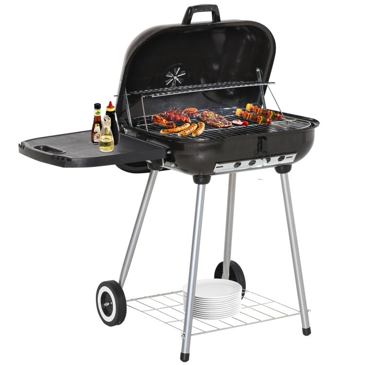 Charcoal barbecue grill with open lid and cooking grate, side shelf on wheeled legs