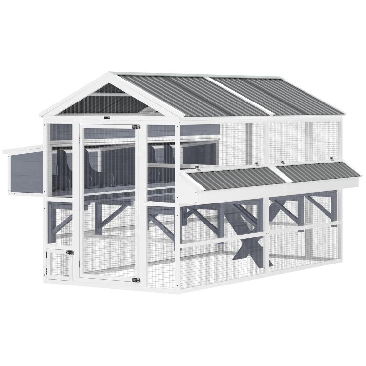 Outdoor wooden chicken coop in white with wire mesh walls and corrugated roof