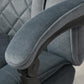 Massage office chair in charcoal gray with padded armrest and side panel detail