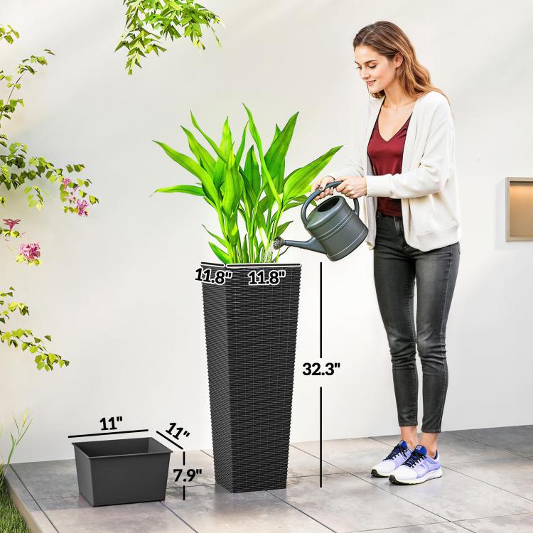 Tall black plastic planters with rattan texture, watering can beside planted pot