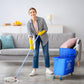 Blue wheeled mop bucket with wringer and mop wringing basket beside a cleaning mop