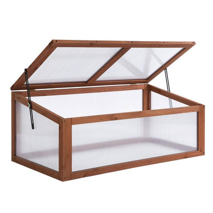 Mini wooden cold frame greenhouse with open top and clear polycarbonate panels