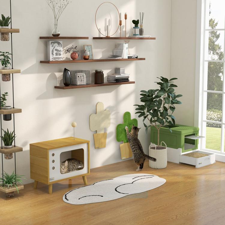Green and white enclosed cat litter box with cat at the front doorway