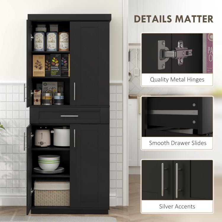 Black pantry cabinet detail: metal hinges, smooth drawer slides, and silver hardware