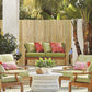 Natural bamboo privacy fence screen behind an outdoor patio seating area