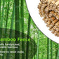 Bamboo fence slats and bundled poles made from natural stalks, light tan.