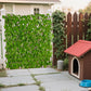 Faux ivy privacy screen panel with green leaves and brown slat border outdoors