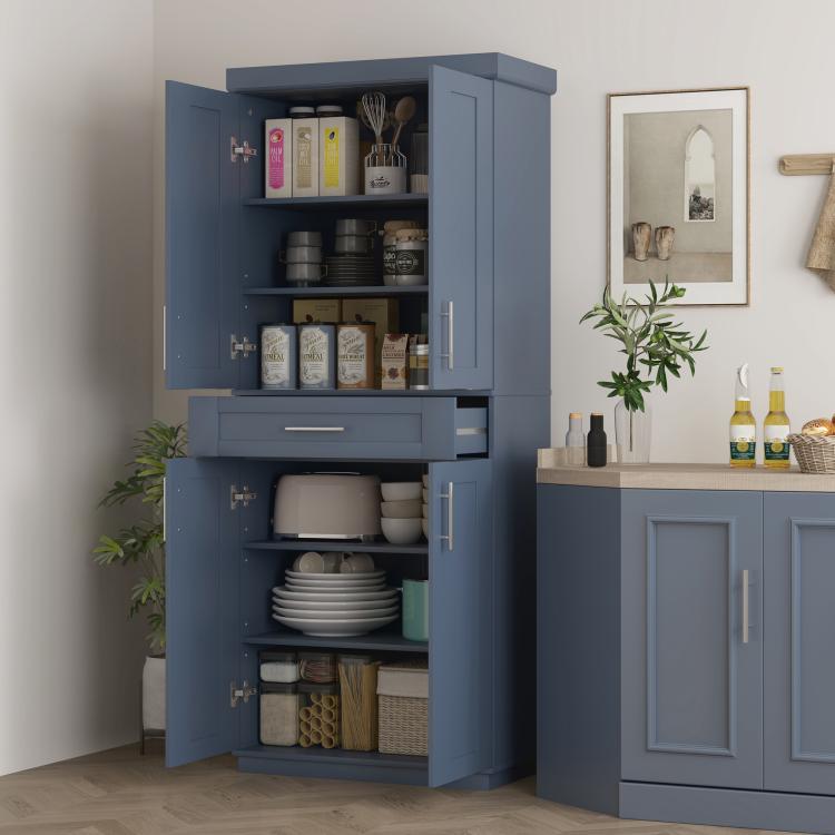 Navy blue pantry cabinet with adjustable shelves, doors, and drawer in use