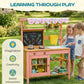 Pink wooden kids mud kitchen playset with canopy, chalkboard panel and cooking area