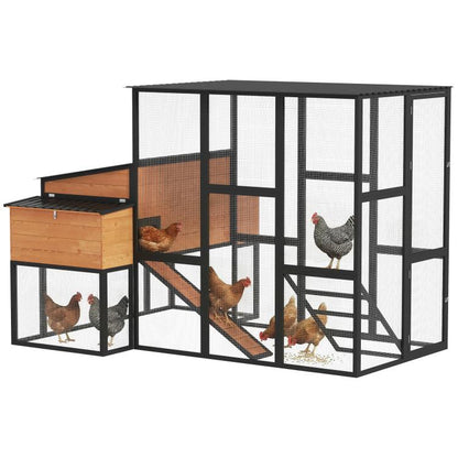 Wooden walk-in chicken coop with wire-mesh sides, ramp, and fenced run