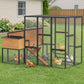 Chicken coop run with wooden nesting boxes, wire mesh walls, and ramp