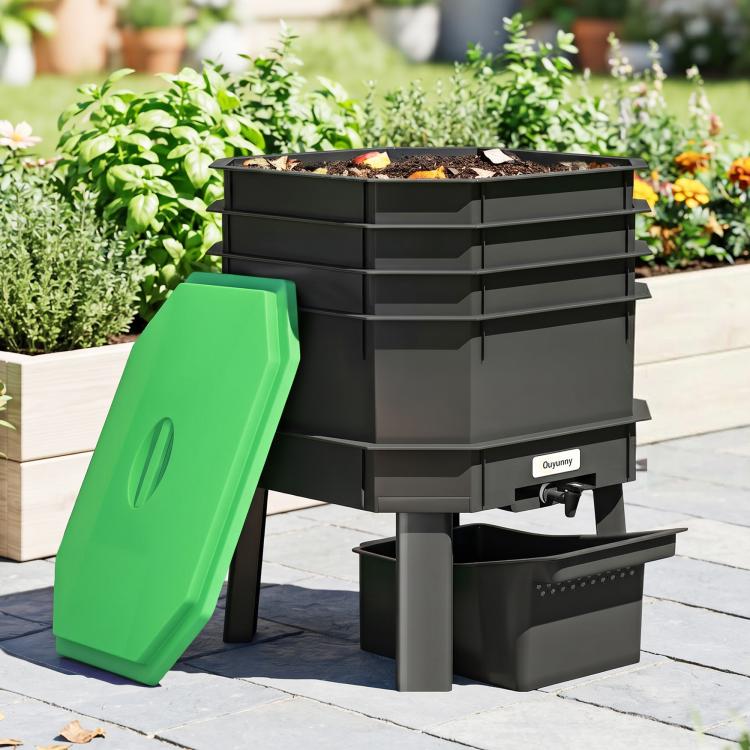 Worm composter with open lid, stacked trays, and front collection base in dark green