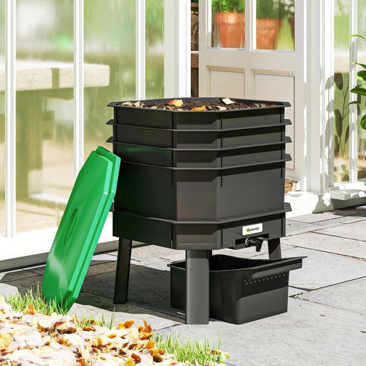 Outdoor worm composter bin with open green lid, stacked trays, and front waste container