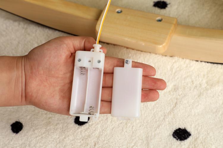 White battery box and wiring for the plush rocking horse