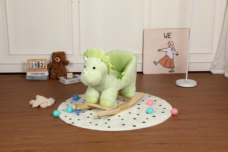 Green plush dinosaur rocking horse angled view with wooden rocker base