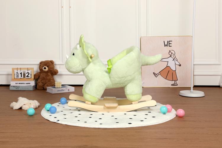Green plush dinosaur rocking horse with wooden base and side legs extended