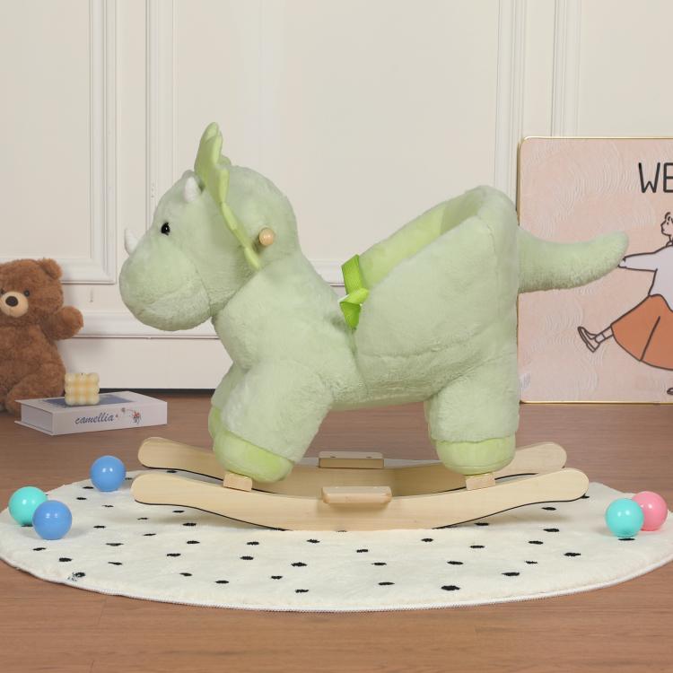 Green plush dinosaur rocking horse with curved wooden base, side view