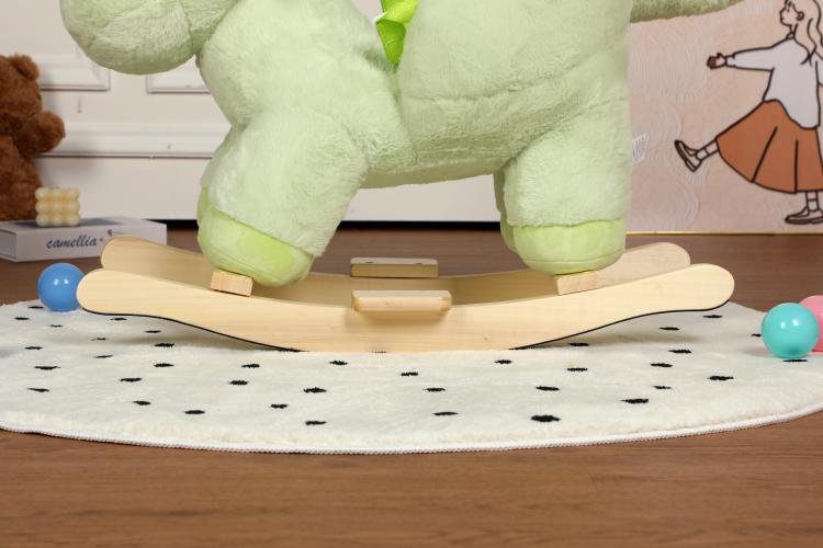 Wooden rocking base under the green plush dinosaur rocking horse ride-on
