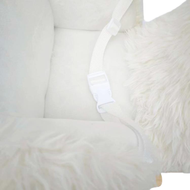 White plush rocking horse with white fabric safety belt strap
