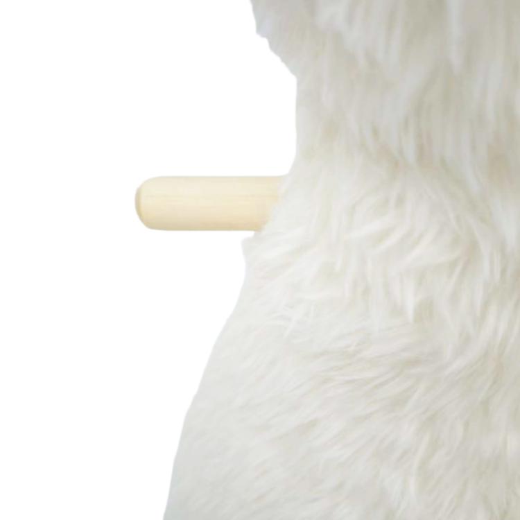 Wooden side handle on white plush rocking horse