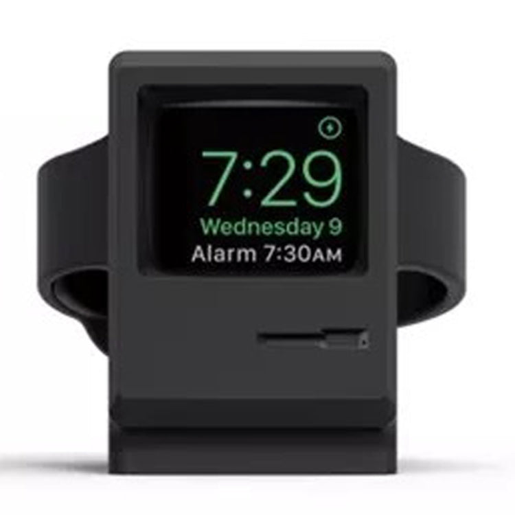Black Apple Watch charging dock stand with digital time display and charging port slot