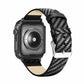 Carbon fiber watch band with tan leather lining and secured metal buckle