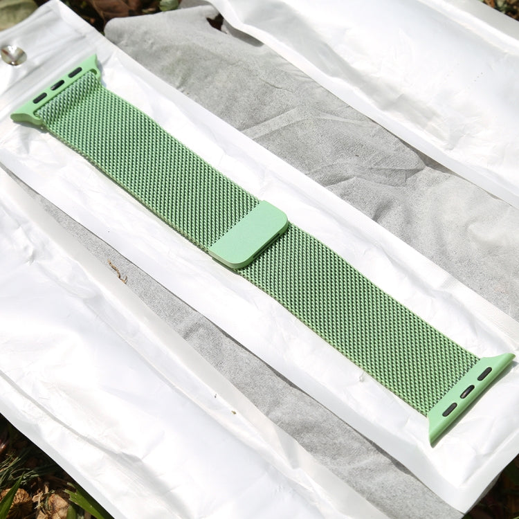 Green woven nylon watch band with magnetic clasp and perforated side slots