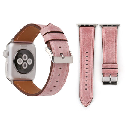 Genuine leather Apple Watch band, pink strap with brown underside and metal buckle hardware