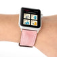 Genuine leather Apple Watch band on wrist, pink strap and silver buckle clasp detail