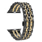 Black metal watch band with gold accent stripe and hidden butterfly buckle, 22mm