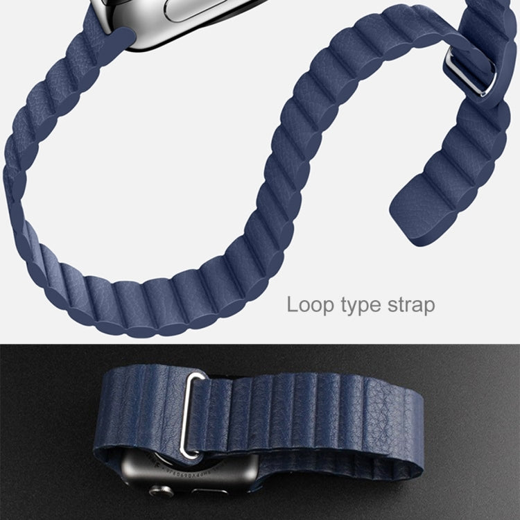 Blue ribbed loop watch band with metal buckle, close-up strap view
