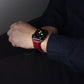 Dark red crocodile-grain leather Apple Watch band on a wrist