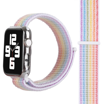 Rainbow nylon Apple Watch band with woven texture, 42mm, watch edge visible