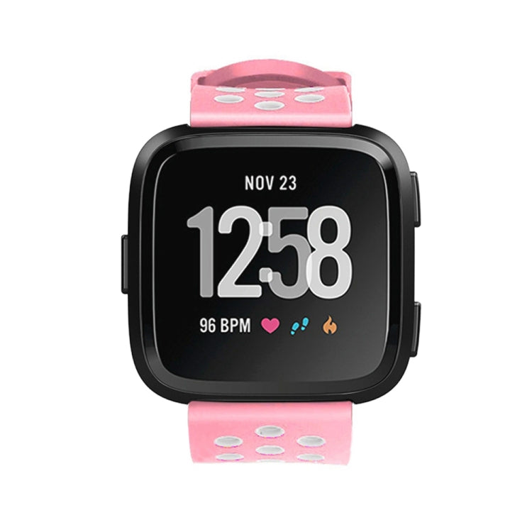 Pink silicone perforated watch band for Fitbit Versa with metal buckle