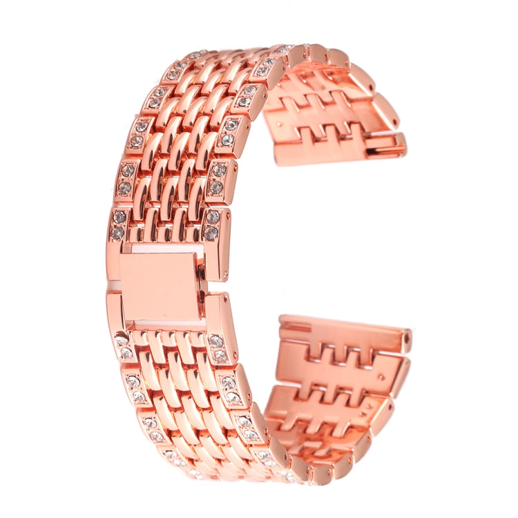 Rose gold metal watch band with interlocking links and sparkling bezel accents.