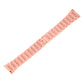 Rose gold metal watch band with repeating link pattern and fold-over clasp end.