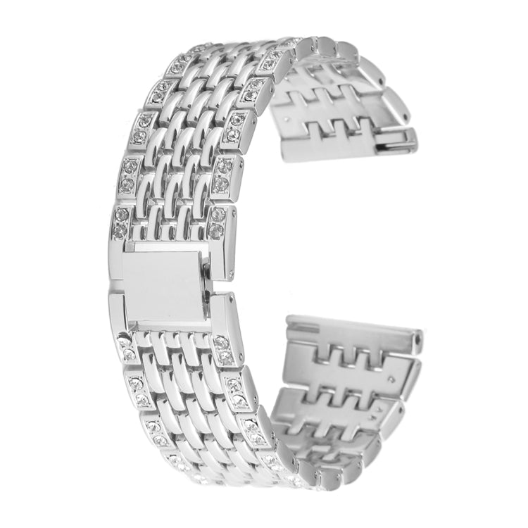 Silver metal watch band with interlocking links, clasp, and rhinestone accent details.