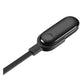Black charging module on USB cable with inline control pod